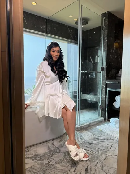Another shot from the getting-ready process. The luxurious bathroom setting adds to the feeling of a calm and pampered bridal experience.