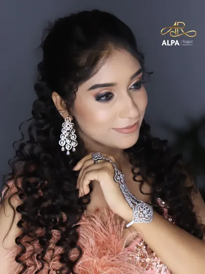 This pose showcases the matching bracelet and the elegant side profile.