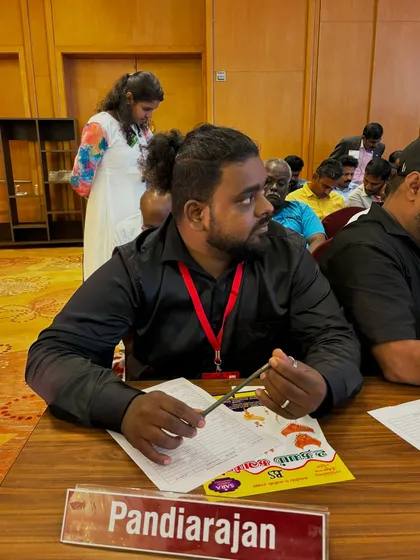 Attending a magic convention as an entrepreneur and international magician. Continuous learning and connecting with other artists is key to my craft.