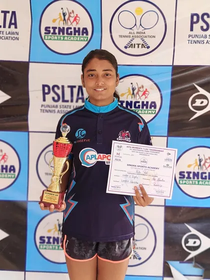 The start of many wins, we hope. A young player with her first major trophy.