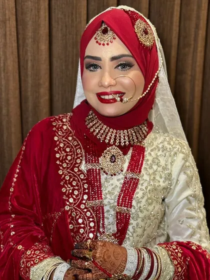 This Hijabi bride is glowing with happiness. Her smile is the best accessory to the beautiful makeup look I created for her.