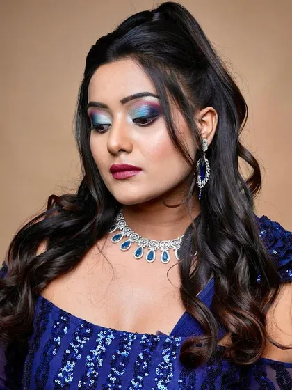 The closed-eye shot shows the beautiful blend of blue and purple, a challenging but rewarding technique you will learn.