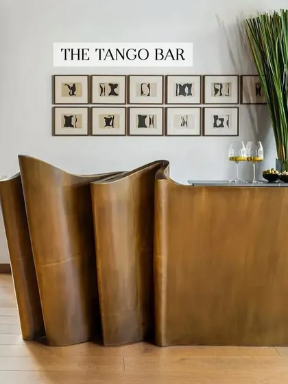 The Tango Bar is one of my most iconic pieces, inspired by the fluid movement of paper waves. Crafted from antique brass, its sculptural form is designed to be the protagonist in any room. It’s a functional bar that doubles as a piece of art, perfect for servicing a lounge, living room, or even an outdoor space.