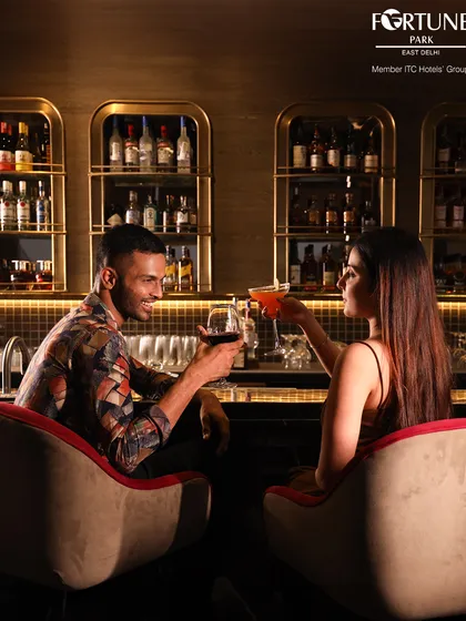 Unwind in the sophisticated ambiance of Neptune Bar. It's the perfect setting for an evening of quiet conversation, classic cocktails, and the smooth sounds of jazz.