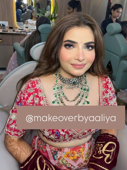 A close-up of the bride's makeup. The watermark shows this is a signature look from my studio, focusing on flawless skin and beautiful eyes.