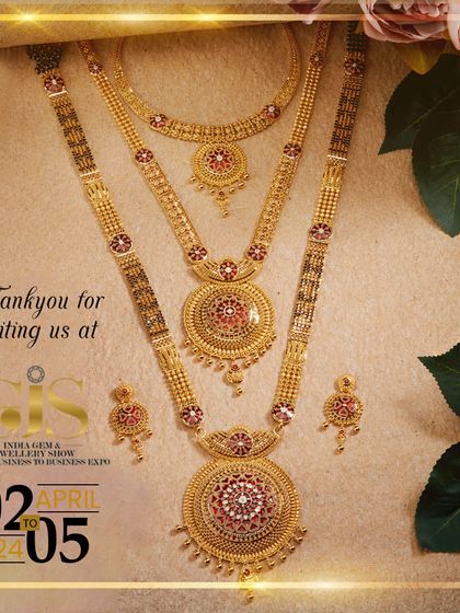 A thank you to our partners, featuring a magnificent multi-layered bridal set. This piece, with its red stone accents and grand design, represents the quality and scale of our offerings.