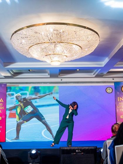 Me on stage doing the Usain Bolt pose. How you do anything is how you do everything. Your legacy is built in the tiny, seemingly insignificant moments of commitment.
