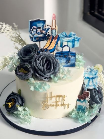When elegance meets a little sparkle, this luxury-themed birthday cake says it all. From designer heels to glam gift boxes, every detail screams "celebration done right."