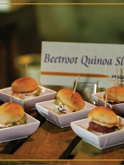 Bite-sized bliss. Our Beetroot Quinoa Sliders are beautifully arranged, showcasing the healthy yet delicious appetizers we offer.
