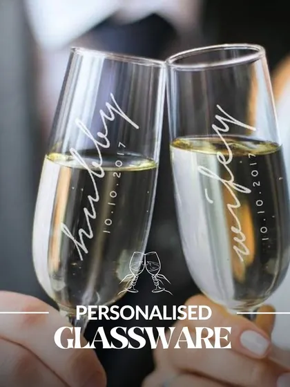 A toast to the newlyweds with their own personalized "Hubby" and "Wifey" champagne flutes. This is one of our most popular offerings for weddings and anniversaries.