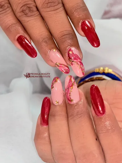A beautiful marble-effect design in shades of pink and red, with delicate gold foil accents running through the pattern for a touch of luxury.