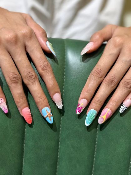 Another view of the maximalist nail art set, showcasing the creativity and skill involved in creating a unique design for every single nail.