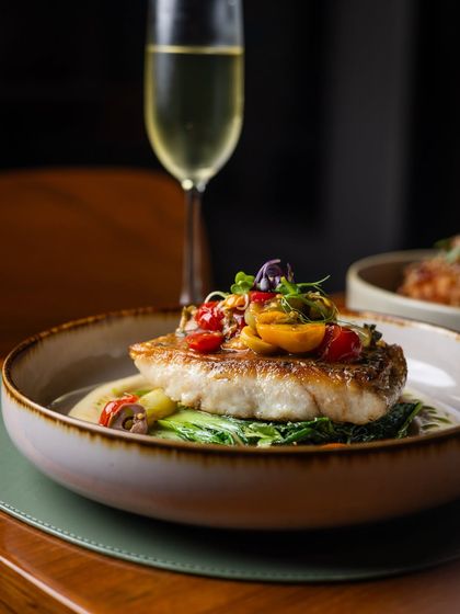 A perfect pairing for a Monday evening. Our protein-forward pan-seared fish main, accompanied by a glass of crisp bubbly.