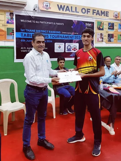 Deepit Patil receives his certificate for winning the Men's category at the 1st District Ranking Tournament, demonstrating his consistent dominance.