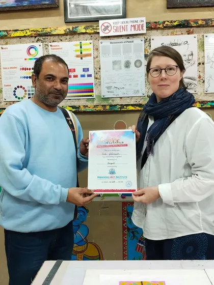 Another student from abroad proudly holding her workshop completion certificate. Art truly has no borders at our institute.