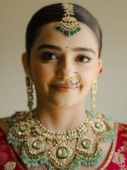 A close-up portrait of the bride, her minimal makeup looking fresh and radiant. This is a testament to the "less is more" philosophy I often teach.