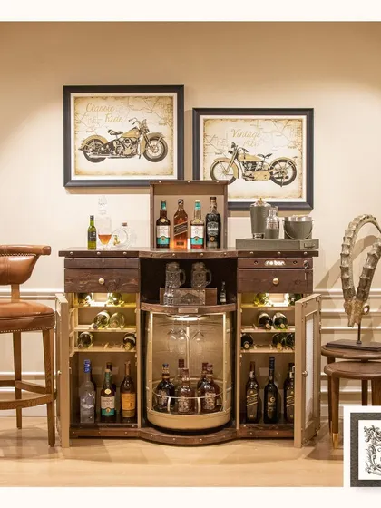 The Barn automated bar, fully revealed. With its side cabinets open and central carousel displayed, this piece showcases its full capacity for bottles, glassware, and bar accessories.
