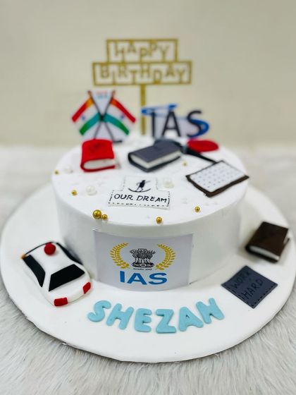 A cake for an aspiring IAS officer, decorated with the national flag, books, and the IAS emblem. It’s a perfect way to celebrate ambition and hard work.