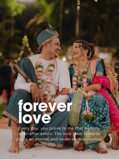 "Forever love" perfectly describes this image. The genuine laughter between the couple, dressed in their traditional wedding best, is a testament to their happiness.