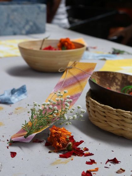 Another shot of the handcrafted bookmark, adorned with flowers. These little details make the workshop experience special.