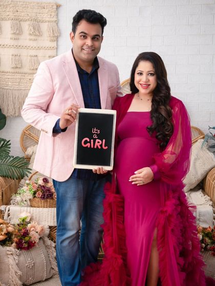 The big reveal. This couple chose to announce "It's a Girl!" during their session, and I was honored to capture their joy and excitement with this fun chalkboard prop.