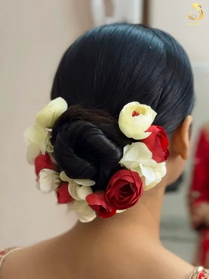 A slightly different angle of the red and white floral bun, showing its perfect shape.