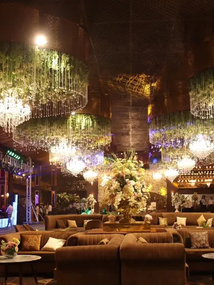 I am proud to work in some of the most luxurious venues. This image showcases a lavish lounge setup for a high-end wedding, where my bar service seamlessly integrated with the opulent decor.