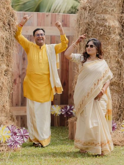 Guests enjoying a photo op within the hay maze. Creating these interactive and picturesque moments is a key part of our event design philosophy.