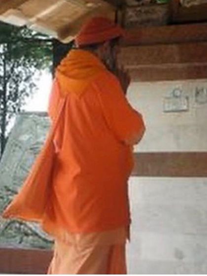 In prayer at the ashram. My personal practice is the source from which all my teaching flows, rooted in the Sivananda tradition.