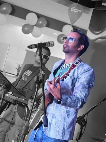 A creative shot of our lead singer during the Micron Technology corporate event.