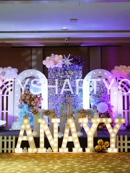 We design adorable and heartwarming setups for classic themes like this Teddy Bear party. The stage features large 3D teddy bear figures, a sparkling backdrop, and personalized light-up letters, creating a cozy and charming atmosphere.