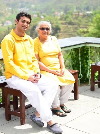 A teacher and student from different generations, both part of the same yoga family. The TTC brings people of all ages and backgrounds together.