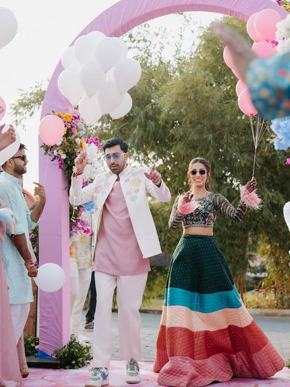 The couple's fun entrance with balloons.