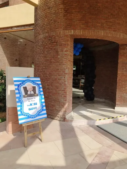 A themed welcome board for a Boss Baby birthday party. The sign, featuring the main character, sets the tone for the event right from the entrance.