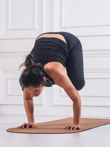 Holding Kakasana. The key is to shift your weight forward, engage your core, and gaze ahead. It's a powerful lesson in finding your center of gravity.