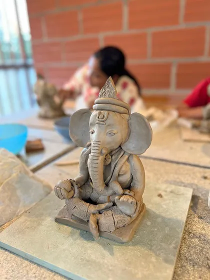 There is a special peace that comes with making a Ganesha idol. This is a close-up of an unfired, eco-friendly clay Ganesha from one of my most loved spiritual workshops.