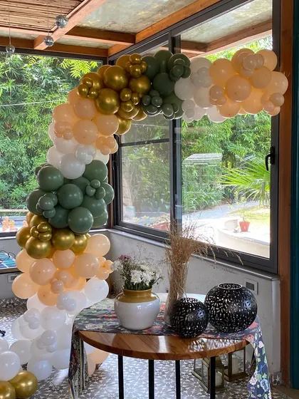 Another angle of the elegant balloon arch, perfect for anniversaries or sophisticated birthdays.