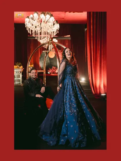 A moment of pure joy and laughter. Komal's happiness is infectious in this candid shot from her sangeet night with Pallav.
