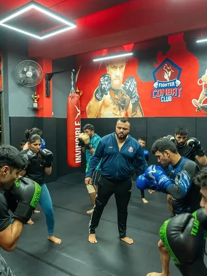 A typical training session at FCC. I am in the middle of the action, guiding my students through boxing drills. This hands-on approach ensures everyone is learning the correct technique and pushing their limits.