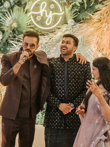 Interacting with the couple and their friends during the Sangeet. It's all about creating a fun, relaxed atmosphere for everyone.