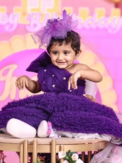 A vibrant 'Pokemon' themed birthday party, with character cutouts, a custom backdrop of the Kanto region, and red and white balloons, ready for a Pokemon battle.