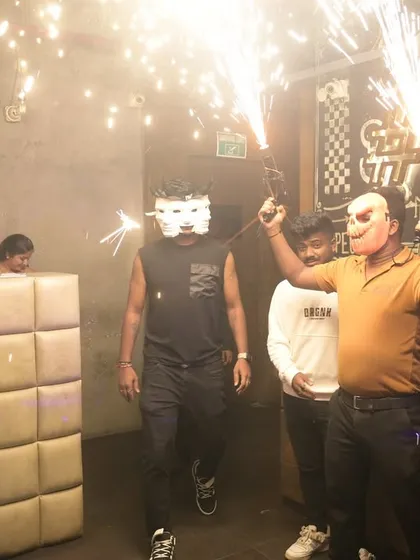 The grand entrance for my "Mask Off" Halloween event, complete with sparklers and a dramatic reveal.