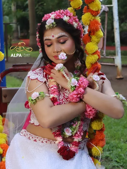 This series of images captures my complete Radha Krishna themed photoshoot. It showcases my skills in creative and character makeup, from the divine blue of Krishna to the delicate, floral look of Radha, including poses that tell a story of their divine love.