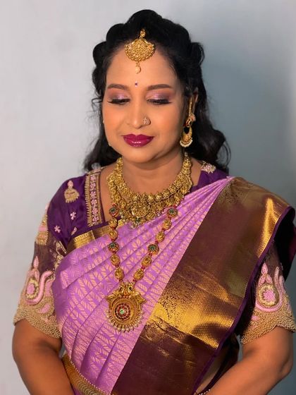 A close-up of the makeup paired with the soft curls.