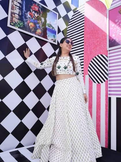 Posing against a cool black and white checkered wall. The venue had so many interesting spots for pictures.
