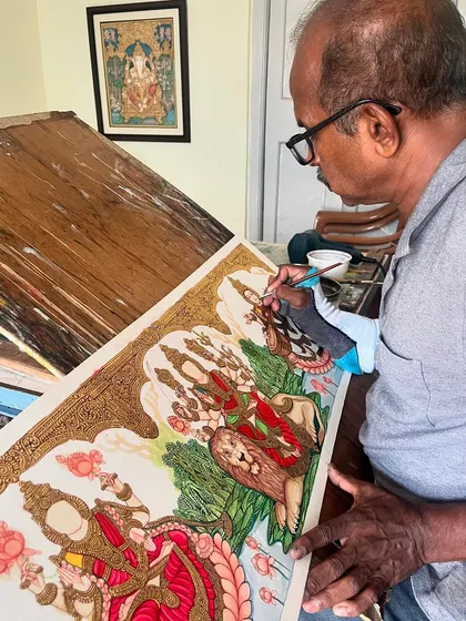 Here I am, immersed in the process of bringing a divine trio to life. This painting of Lakshmi, Saraswathi, and Durga Devi shows the focus and passion that goes into our larger, more detailed commissions. Each piece is a form of devotion.