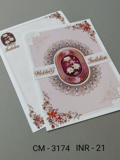 A simple and affordable vertical invitation with a floral and mandala design. The card has a classic look and is perfect for any traditional ceremony.