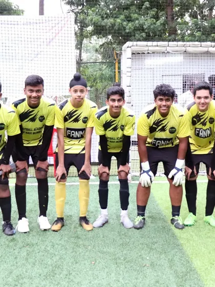 The senior team, including our goalkeeper, posing for a photo before their Independence Cup game.