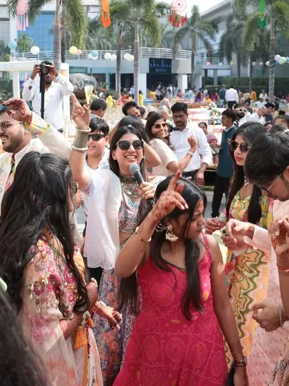 Dancing in the crowd, fully immersed in the celebration. I believe in being a participant, not just an observer.