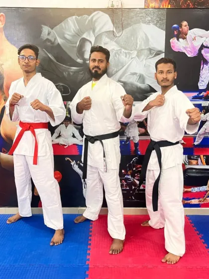 Another shot of my karate team. The different belt colors show the journey of progress, but the fighting spirit is the same in all of them.